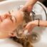 Women getting a hair and scalp spa treatment
